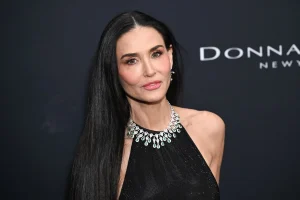 Demi Moore Stuns in Sheer Gucci Gown at WWD Style Awards