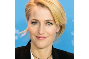 Gillian Anderson Stuns in Paris with Chic Black Dresses