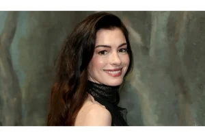Anne Hathaway Drops ‘Burial’ Track Co-Written with Charli XCX