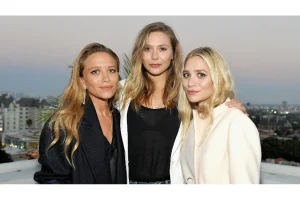 elizabeth olsen stuns in givenchy mules at paris fashion week
