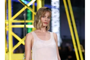 Margot Robbie Sparks Weight Loss Rumors in Sheer Top Reveal