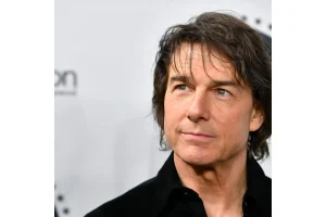 Tom Cruise Shares Sweet Kiss with Elle Fanning at Reunion
